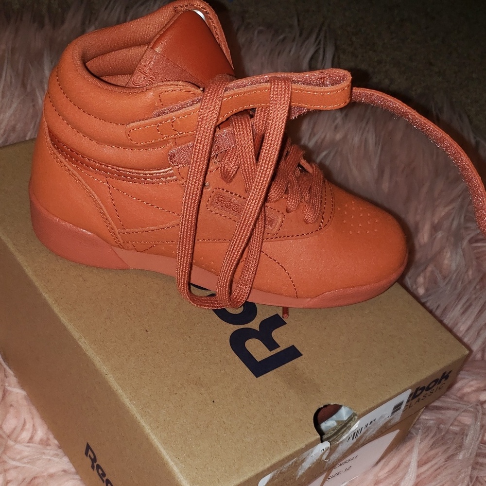 Orange 54.11 Reeboks